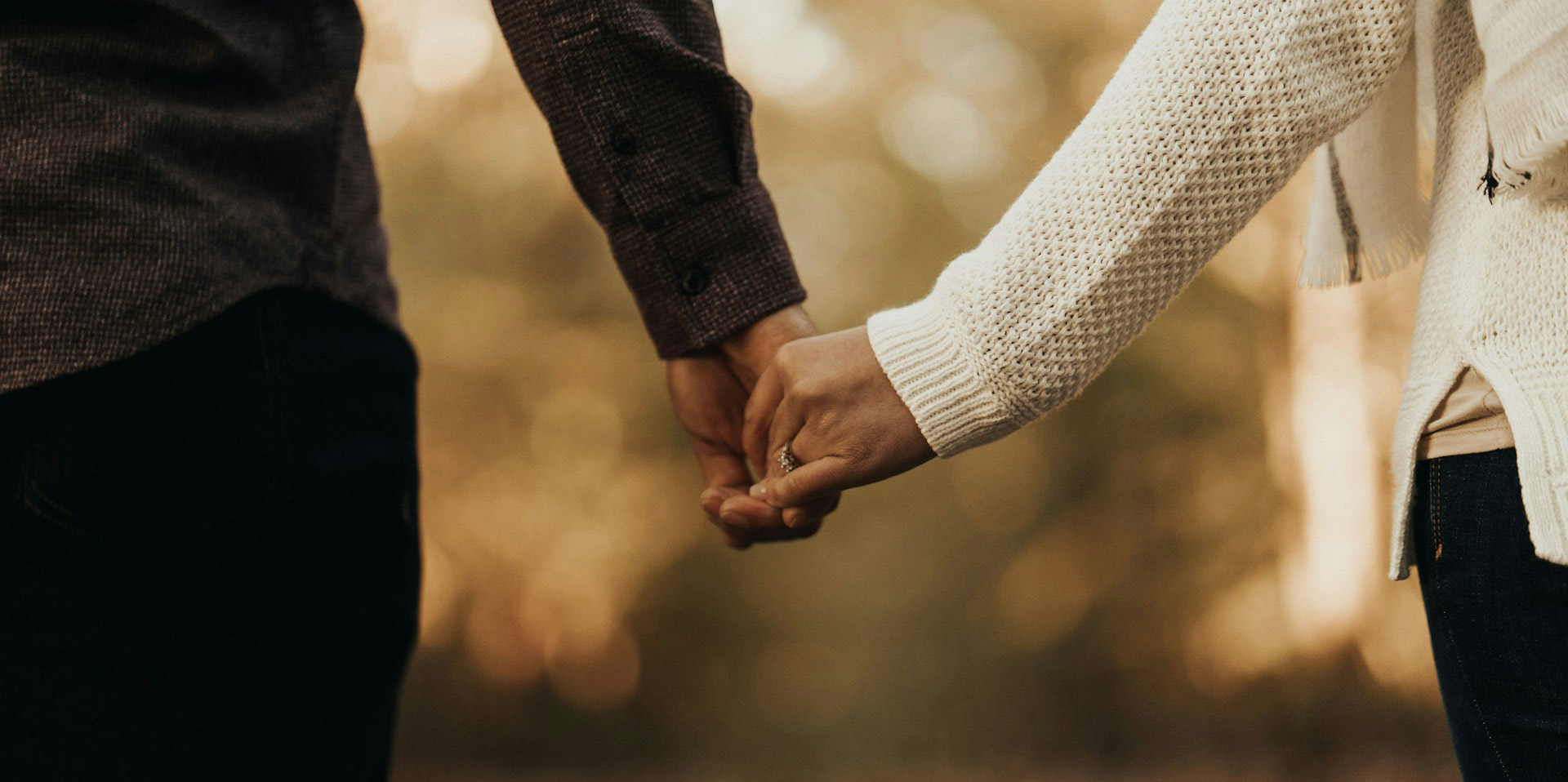 Couple holding hands